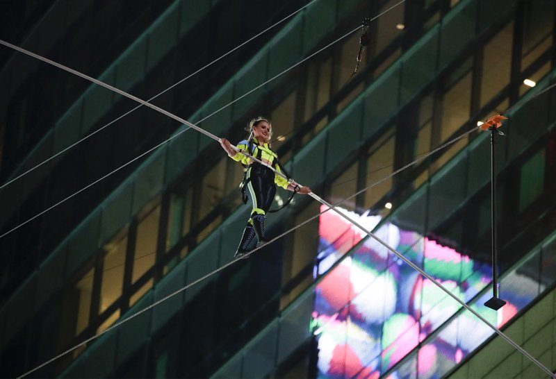 [watch] high flying duo tightrope nyc skyscrapers