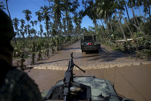 Mexican military tries to reach residents stranded by Hurricane Patricia.
