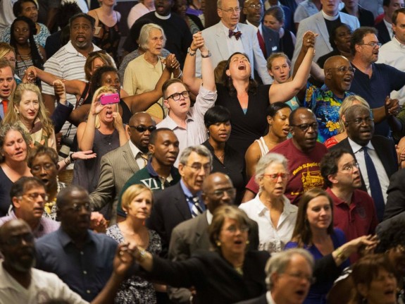 Parishioners of all races joined together for a memorial service at Morris Brown AME Church for the people killed during a prayer meeting in Charleston, S.C., June 18, 2015.