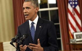 President Barack Obama addresses the nation from the Oval Office at the White House in Washington, Sunday night, Dec. 6, 2016.  In a rare Oval Office address, Obama vowed the United States would overcome a terror threat that has entered a "new phase" as he sought to reassure Americans shaken by recent attacks in Paris and California.   (Saul Loeb/Pool Photo via AP)