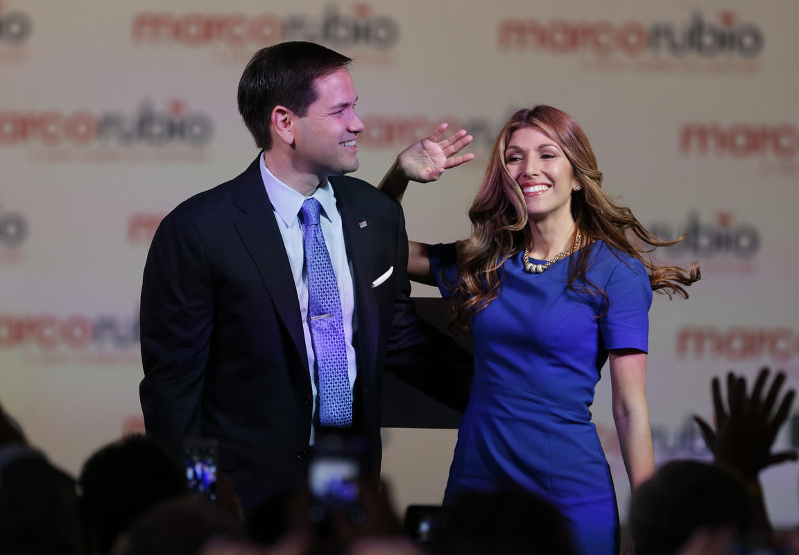 In this photo taken April 13, 2015, Sen. Marco Rubio, R-Fla., and his wife Jeanette acknowledge the crowd after he announced that he will be running for the Republican presidential nomination, in Miami. During Rubios first year in the Florida legislature, the 29-year-old lawmaker filled out the required forms detailing his personal finances. On the line listing his net worth, Rubio wrote: 0. Fourteen years later, after rising to lead the Florida House as speaker, winning election to the U.S. Senate and earning at least $4.5 million since 2001 at a series of six-figure jobs and by writing a best-selling memoir, Rubio has seen his net worth improve only modestly. (AP Photo/Wilfredo Lee)