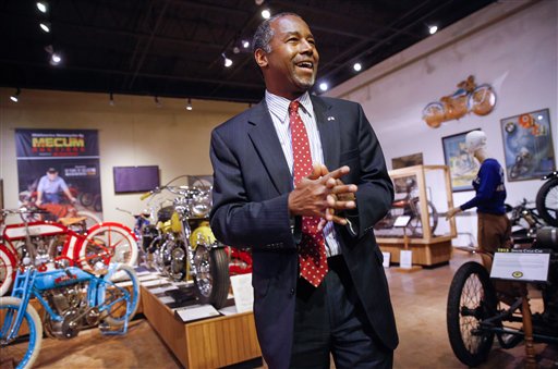 Republican presidential candidate, Dr. Ben Carson walks through the National Motorcycle Museum in Anamosa, Iowa, Thursday, Jan. 7, 2016, after holding a town hall. (AP Photo/Patrick Semansky)