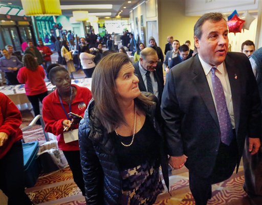 Republican presidential candidate, New Jersey Gov. Chris Christie and his wife Mary Pat arrive at a campaign stop at a college student convention, Tuesday, Jan. 5, 2016, in Manchester, N.H. (AP Photo/Jim Cole)
