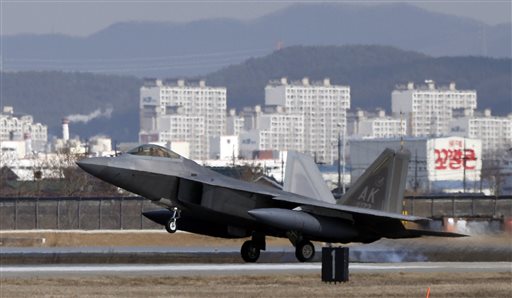 One of four U.S. F-22 stealth fighter lands at Osan Air Base in Pyeongtaek, South Korea, Wednesday, Feb. 17, 2016. (AP Photo/Lee Jin-man)