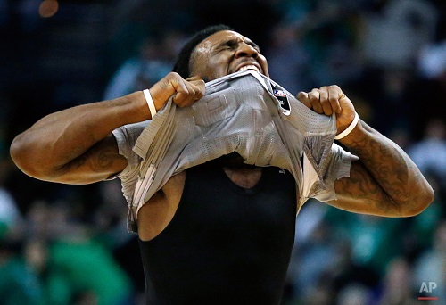Boston Celtics' Jae Crowder reacts after missing a 3-pointer at the buzzer during the fourth quarter of an NBA basketball game against the Brooklyn Nets in Boston, Saturday, Jan. 2, 2016. The Nets won 100-97. (AP Photo/Michael Dwyer)