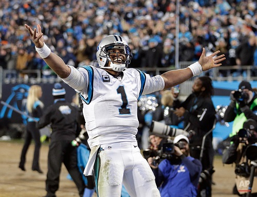 Carolina Panthers' Cam Newton celebrates a touchdown pass during the second half of the NFL football NFC Championship game against the Arizona Cardinals Sunday, Jan. 24, 2016, in Charlotte, N.C. (AP Photo/Chuck Burton)
