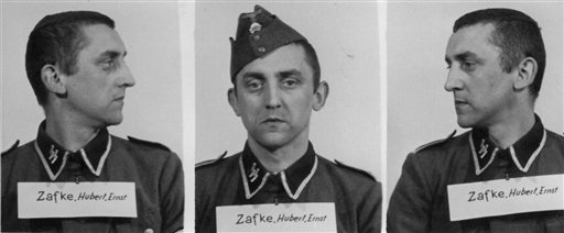 The undated photo provided by the Archive of the State Museum Auschwitz-Birkenau shows SS Oberscharfuehrer Hubert Zafke. Zafke, now 95, is scheduled to go on trial Monday, Feb. 29, 2016 in Neubrandenburg, north of Berlin, on 3,681 counts of accessory to murder on accusations he served as a medic at an SS hospital in Auschwitz in 1944. (The Archive of the State Museum Auschwitz-Birkenau via AP)