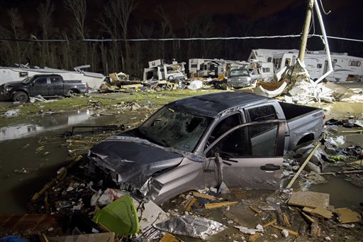 Destroyed trailers and vehicles are all that remain of the Sugar Hill RV Park after a suspected tornado hit the park in Convent, La., Tuesday, Feb. 23, 2016. (AP Photo/Max Becherer)