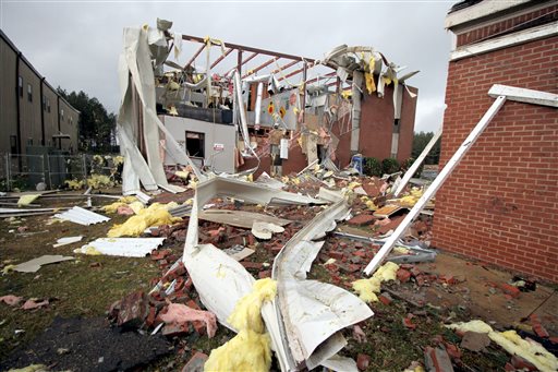 Debris lies on the ground near First Baptist Church of Collinsville in Lauderdale County, Miss., after it was severely damaged during a storm Tuesday, Feb. 2, 2016. Authorities say a large tornado in rural western Alabama left a trail of damage as powerful storms moved into the state. (Paula Merritt /The Meridian Star via AP) MANDATORY CREDIT
