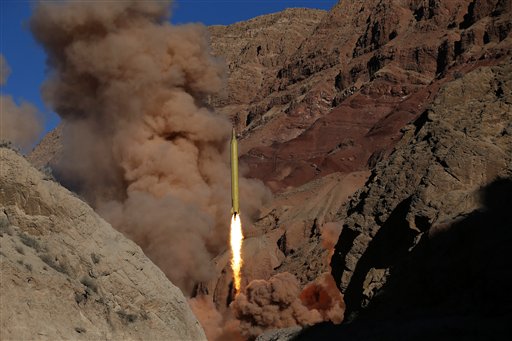 A Qadr H long-range ballistic surface-to-surface missile is fired by Iran's powerful Revolutionary Guard, (AP Photo/Fars News Agency, Omid Vahabzadeh)