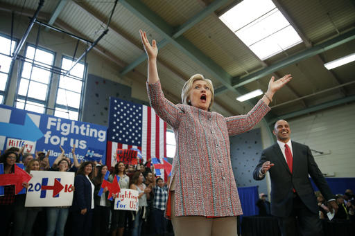 Democratic presidential candidate Hillary Clinton reacts while taking the stage at a rally at Hartnell College, Wednesday, May 25, 2016, in Salinas, Calif. (AP Photo/John Locher)