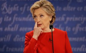 Democratic presidential nominee Hillary Clinton listens to Republican presidential nominee Donald Trump during the presidential debate at Hofstra University in Hempstead, N.Y., Monday, Sept. 26, 2016. (AP Photo/Julio Cortez)