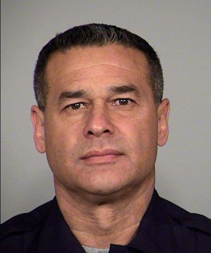 This undated image released by the San Antonio Police Department shows 20-year police veteran, Det. Benjamin Marconi, 50, who was shot and killed Sunday, Nov. 20, 2016, while on duty in San Antonio, Texas. Marconi was shot to death in his squad car while writing out a traffic ticket. (San Antonio Police Department via AP)
