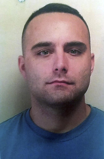 In this undated photo released by the Americus Police Department, Americus Police Officer Nicholas Smarr poses for a photo, in Americus, Ga. Police Chief Mark Scott said officer Smarr died and Georgia Southwestern State University Officer Jodi Smith was airlifted to a hospital in critical condition after the officers were shot while responding to a report of a domestic dispute at an apartment complex near the campus Wednesday morning, Dec. 7, 2016. (Americus Police Department via AP)