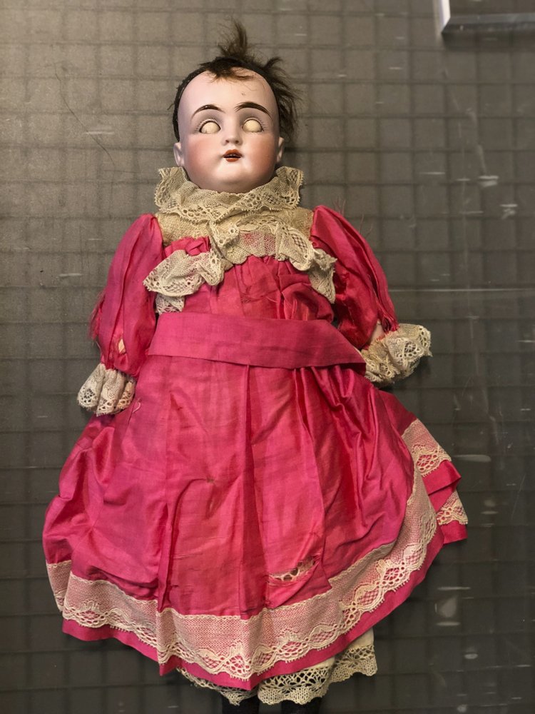 creepy looking dolls